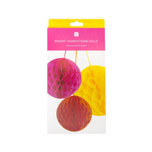 Load image into Gallery viewer, this shows the packaging for the honeycomb ball decorations.  the cardboard packet is illustrated with a photo of the three balls; one yellow, one orange and one pink.