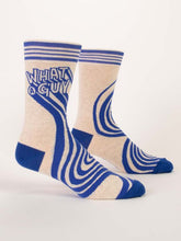 Load image into Gallery viewer, What a Guy Men’s crew Socks by Blue Q | £11.95. Ethical and sustainable socks with quirky, humorous designs and vibrant colours.  This design is in white and blue with an abstract swirl pattern emerging from the words “What a guy”. 
