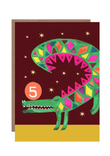 Load image into Gallery viewer, This brightly coloured 5th birthday card features a multi coloured crocodile balancing on his front feet with a ball with the number 5 on his nose