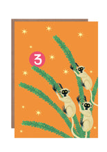 Load image into Gallery viewer, Brightly coloured 3rd birthday card featuring 3 lemurs climbing in a monkey puzzle tree