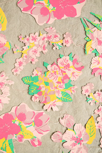 screen printed flower garland,flowers are printed in soft pink,bright pink and yellow 