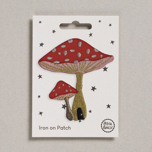 The Toadstool iron on patch comes on a plastic free card