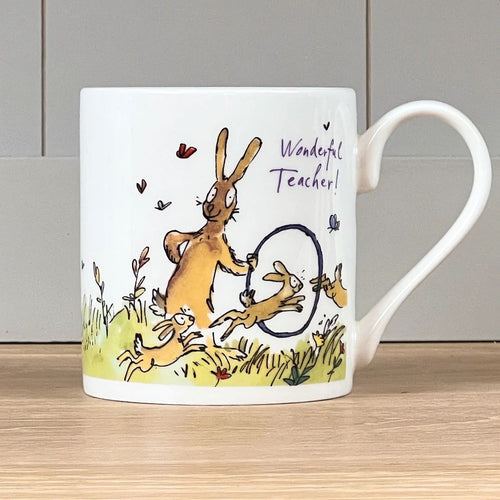 The front of the mug features a Quentin Blake illustration of a hare teaching young hares to jump through hoops.