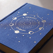 Load image into Gallery viewer, Navy Five Year Thought a Day Journal by Lisa Angel | £12.00. This adorable pocket-sized journal is covered in navy fabric and adorned with gold foil details on the front cover. Featuring a moon phase emblem on the front of the book, the pretty gold details perfectly match the glittering golden page edges. 
