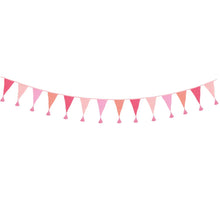 Load image into Gallery viewer, the bunting in four different shades of pink with tassles is seen simply hanging on a white background
