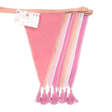 Load image into Gallery viewer, Cotton bunting with tassles at the bottom of the pennants.  Here it is folded up so that you can see the 4 different shades of pink of the pennants.
