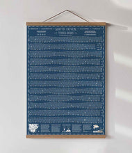 Load image into Gallery viewer, Dark blue tidal chart poster, hanging in an oak poster hanging kit on a white wall