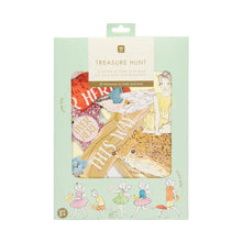 Load image into Gallery viewer, The fairy tresure hunt game is seen in its flat cardboard, plastic free, packaging.  The box is pale green and is decorated with fairies.  In the centre there is an illustration  of  what you could see if there was a cut out window in the box; a rangle of the pieces including a fairy on a hedgehog, and signs on little cardboard cutouts saying &quot;over Here&quot; and &quot;This Way&quot;.
