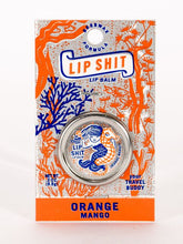 Load image into Gallery viewer, Orange & Mango Lip S**t by Blue Q | £7.50. All natural, vitamin E fortified lip balm. The lip balm is contained within a round metal tin with a sticker on the front depicting mermaid riding a seahorse with the words “Lip Shit” above.