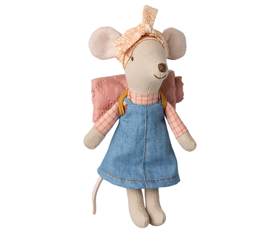 Hiker mouse wears a blue denim dress, a peachy patterned head scarf and a has a pink roll up matt on her back with mustard yellow straps