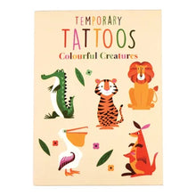 Load image into Gallery viewer, Packaging of temporary tattoos with colorful animal illustrations on a beige background
