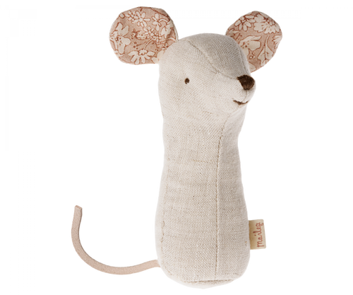 cream mouse shaped rattle with floral inside to ears.  the rattle has a tail but to arms or legs. making a nice shape for little hands to grasp