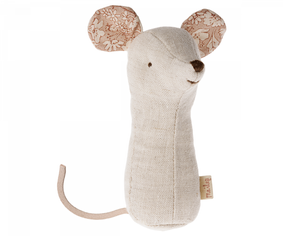 cream mouse shaped rattle with floral inside to ears.  the rattle has a tail but to arms or legs. making a nice shape for little hands to grasp