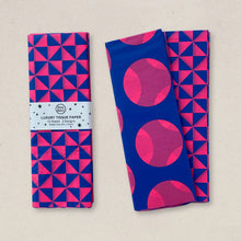 Load image into Gallery viewer, Blue and pink tissue paper against a pale grey background.
