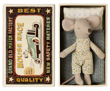 Load image into Gallery viewer, Maileg toy mouse in matchbox styled box.  The box has an illustratiion remeniscent of an old matchbox with a picture of a mouse driving an old open car.  Around the edges as the words &quot;Grand Old Match Factory, New SAfety Matches&quot;.  The mouse inside has a soft blue striped mattress an a soft blue knitted blanket.  He is wearing a fixed spotty shirt with little collars and some matching spotty trousers.  HEe also has a sweet delicatley patterned pillo, cream with a blue repeating pattern.
