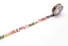 Load image into Gallery viewer, Decorative tape with colourful pattern of little houses on a white background
