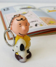 Load image into Gallery viewer, Peanuts Light-Up Keyring - Charlie Brown and Snoopy
