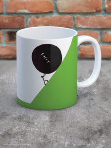 David Shrigley Boxed Mug - S**t Ball | £10.00| Brainbox Candy. White ceramic mug with David Shrigley line drawing of a ball of s**t (poo) pusing a stick man down a hill. The perfect gift for fans of humorous, quirky illustration.