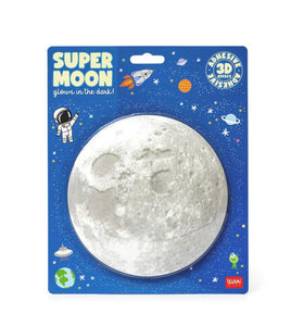 3D Adhesive Moon In blister pack on dark blue card 