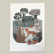 Load image into Gallery viewer, Signed art print.  A fox can be seen in the garden in the foreground, while in the background her cubs are emerging from under the garden shed behind which mature trees can be seen
