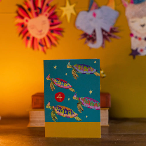 This 4th birthday card by hutch Cassidy features four brightly coloured swimming turtles in part hats.  The number 4 is prominent in a brightly coloured circle