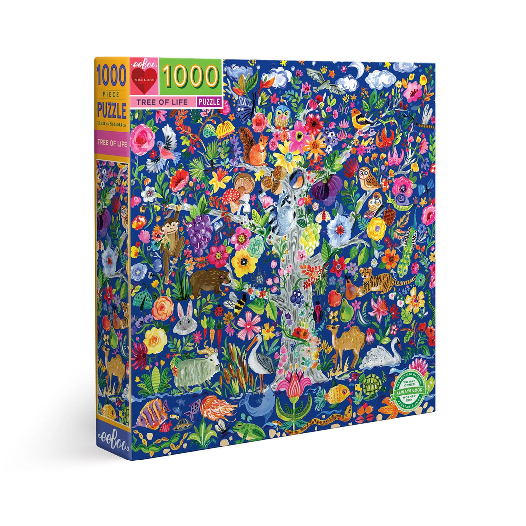 This is an image pf the boxed puzzle of The Tree of Life 1000 poece puzzle.  The background og th puzzle is dark blue and the tree of life depicted is extremely colourful with many different animals and insects and plants and flowers on its branches and surrounding it.