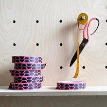 Load image into Gallery viewer, Bright pink paper tape roll, with a design of black alternating semi circles.  Retro looking design.  Fits perfectly on standard sellotape dispenser. 
