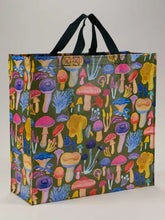 Load image into Gallery viewer, Mushrooms Shopper Bage by Blue Q| £11.95. Colourful shopper bag by Blue Q, with a green background with lots of different colourful species of mushroom covering it.
