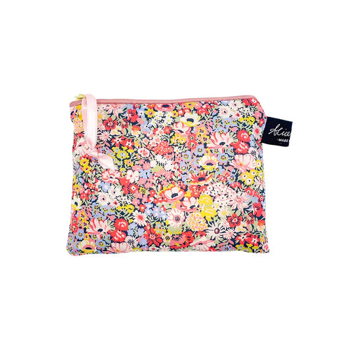 Small fabric purse in liberty fabric thorpe hill print. Small Pink and yellow flowers 