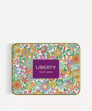 Load image into Gallery viewer, Liberty floral print tin with “Liberty Tin of Labels” printed in the middle in a purple rectangle.
