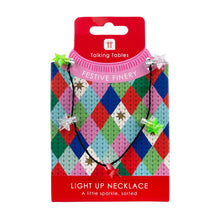 Load image into Gallery viewer, Light Up Stars LED Necklace by Talking Tables
