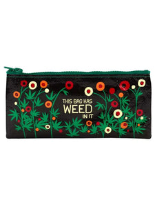 Black pencil case with a dark green zipper. The pencil case has weed plants on and white writing in the center that reads "This bag has weed in it.".