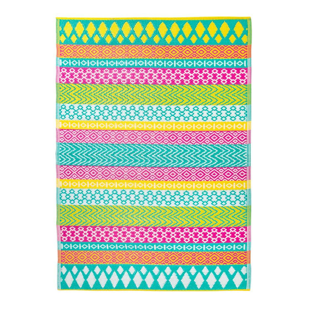bright plasti rug in a scandi like geometric pattern turquoise, fuschia pink, bright green and yellow.