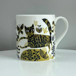 Black and yellow hand illustrated design of ornately decorated cats surrounded by bugs and flowers. 