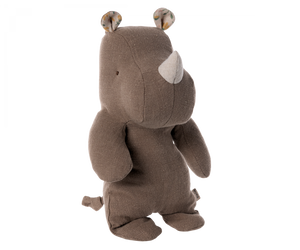 fabric toy rhino, in a subtle brown colour with a cream coloured  tusk 