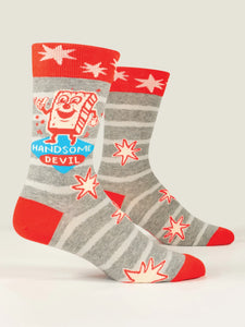 Grey and white striped socks with red cuff, heel and toe.  the words Handsome Devil are on the side with a cartoon illustration of a smiling walking square shaped chareacter