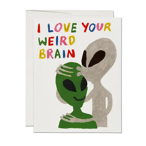 This funny card features two aliens, one is carresing the other and reads 