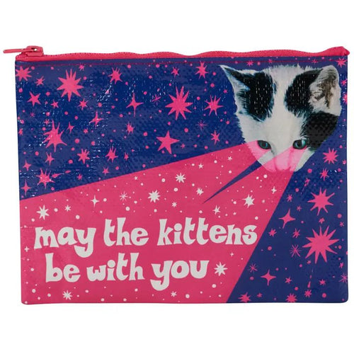 A navy blue zip bag with pink zip Illustrated with pink stars and laser beams shining from a blank and white cat's eyes. Reads 'may the kittens be with you' 