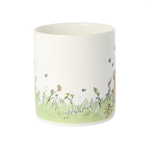 the back of the bone china mug features a continuation of grass and butterflies draw by Quentin Blake