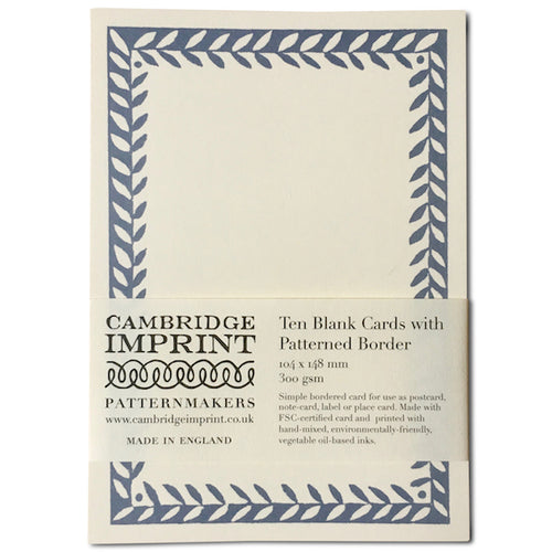 Pack of 10 postcards plain with cornflower blue leaflike patterned border. A wrap  around paper label holds them together, printed with Cambridge Imprint’s logo and product information.