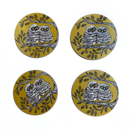 4 mustard colour round melamine coaster featuring 2 baby owls on a branch