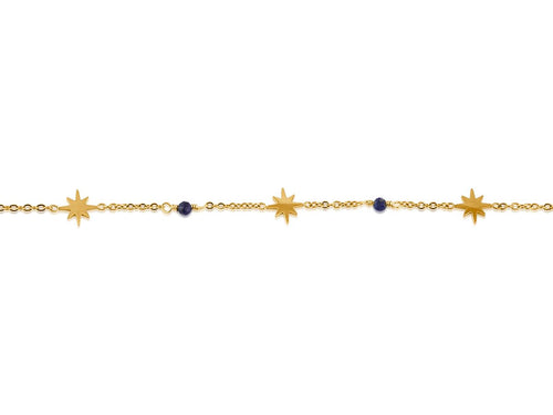 Gold bracelet with star shaped charms and small blue beads on white background