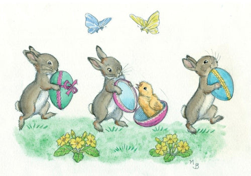 Illusration by Molly Brett of three rabbits carrying easter eggs.  The middle rabbits egg has come open and there is a little chick in it.  Primroses are flowering in the foreground and butterflies are flying above them.
