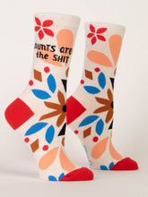 Load image into Gallery viewer, Cream socks with a vibrant floral design in blue, peach and red and the text Aunts are the Shit on the side in an informal font.  Red heel and toes
