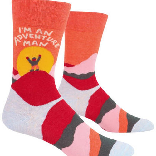 I’m An Adventure Man Men’s crew Socks by Blue Q | £11.95. Ethical and sustainable socks with quirky, humorous designs and vibrant colours. This design features a mountainous landscape with a man on top with the sun behind him and the words “I’m and Adventure man” above.  
