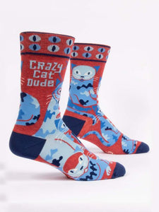 Crazy Cat Dude Men’s crew Socks by Blue Q | £11.95. Ethical and sustainable socks with quirky, humorous designs and vibrant colours. This design is in red with blue abstract cats and different coloured cat eyes with the words “Crazy Cat Dude” above. 